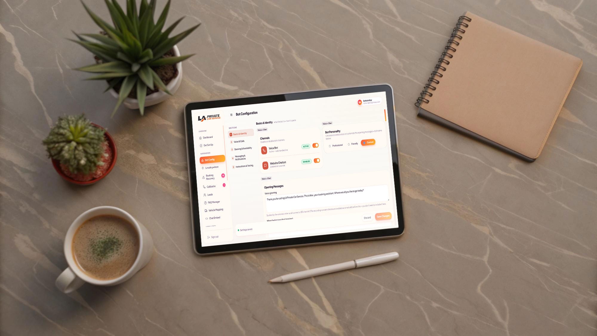 The bot configuration screen open on a tablet at a desk