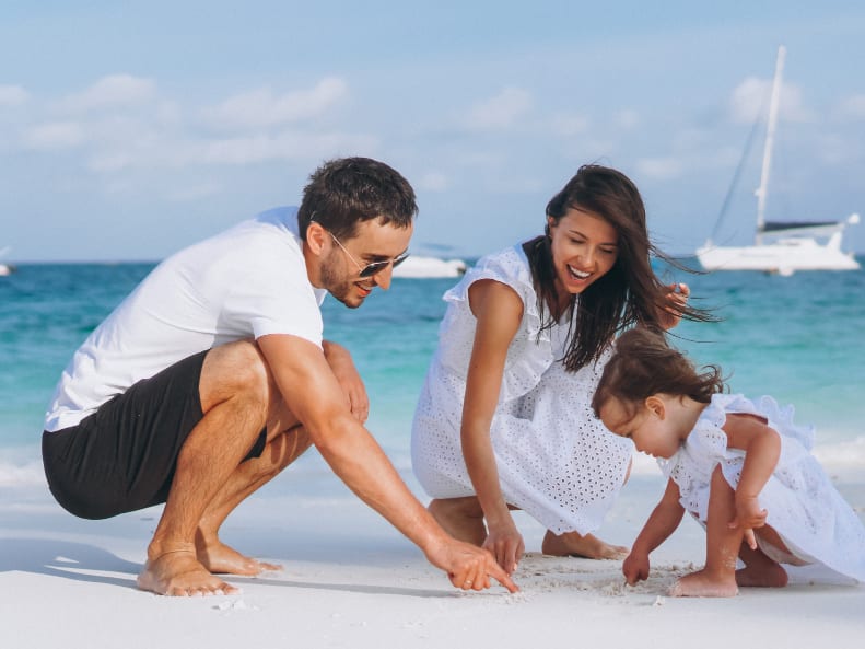 A family on the beach during time off