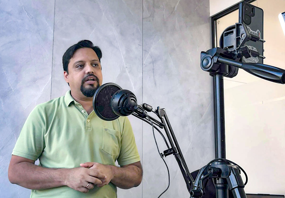 A colleague recording to camera and microphone