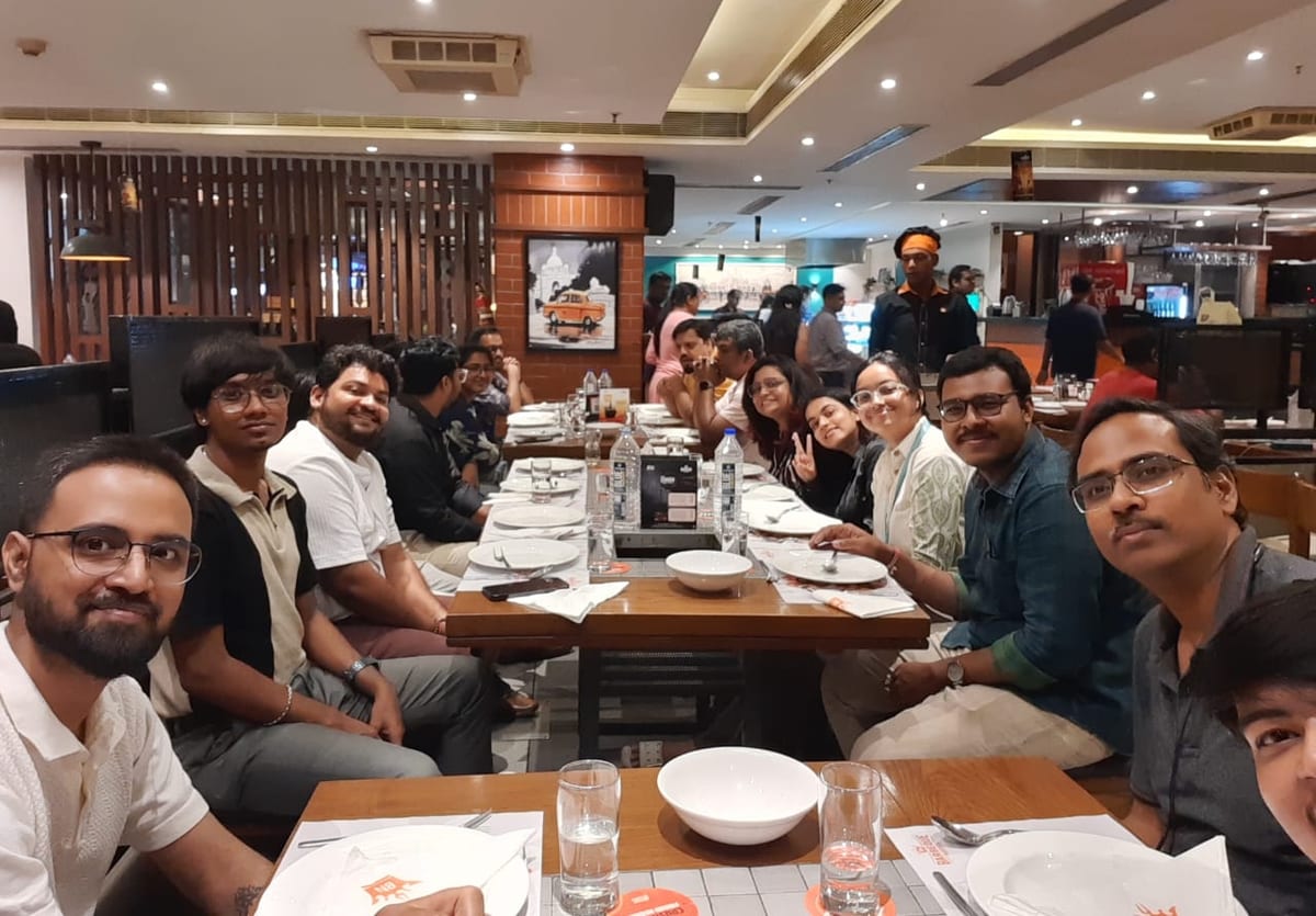 The team around a long table at a dinner out